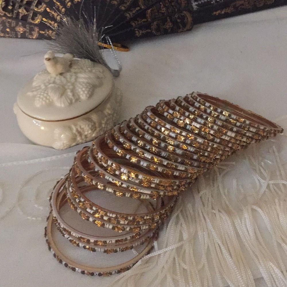 Bangles with gold glitter on white and black base
